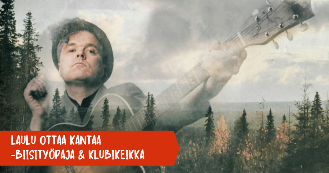 Jukka Takalo kitaran kanssa. Taustalla pohjoinen metsämaisema.